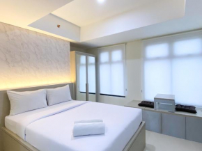 Homey Studio at Pollux Chadstone Apartment By Travelio